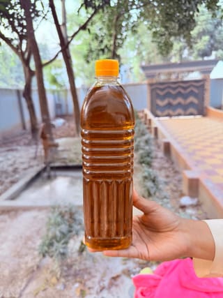 তেতুল কাঠের ঘানি ভাঙা সরিষার তেল 3