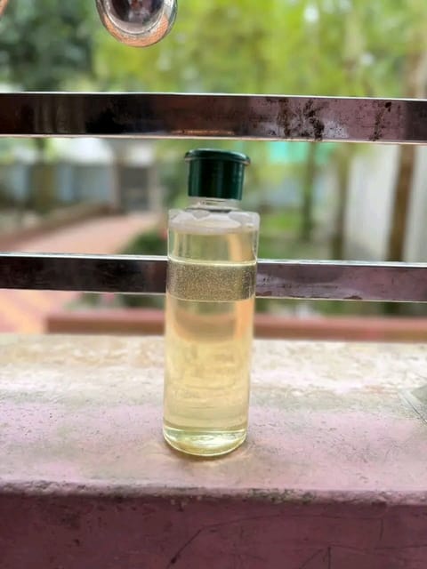 কাঠের ঘানির নারিকেল তেল হাফ কেজি