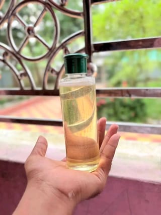 কাঠের ঘানির নারিকেল তেল হাফ কেজি 3