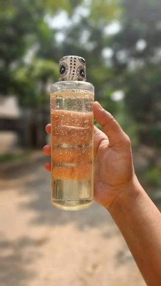কাঠের ঘানির নারিকেল তেল হাফ কেজি 4
