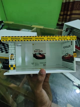 Premium handmade Ferrari SF90 themed LED diorama with luxury showroom design and battery-powered lighting. Perfect for displaying 1:64 scale diecast cars, photography setups and collectors. 2